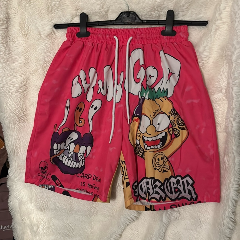 Pink Athletic Shorts with Bold Graphics